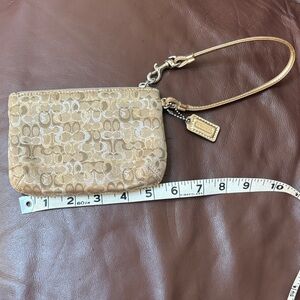 Coach Metallic Gold Signature Wristlet Pouch  Very pretty! In great Condition